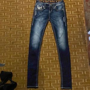 Medium to dark wash rock revival skinny jeans